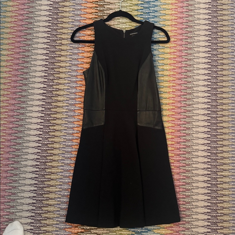 Club Monaco black dress with leather paneling. Size 6